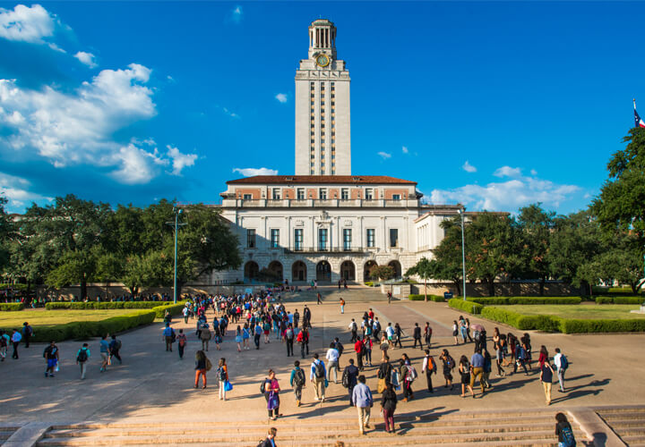 Students walking on main mall in front of University of Texas tower