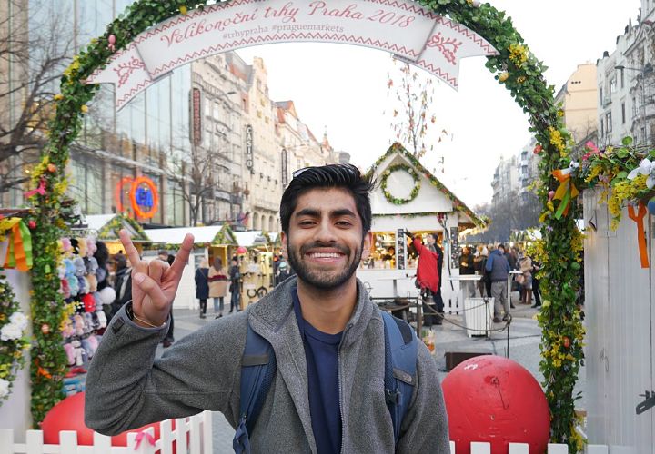 Study abroad student gives hook em horns in Prague