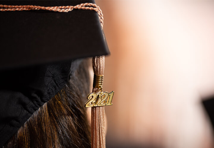 Closeup of 2021 tassel on graduation cap
