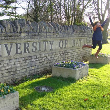 Student jumps in front of University of Bath stone sign
